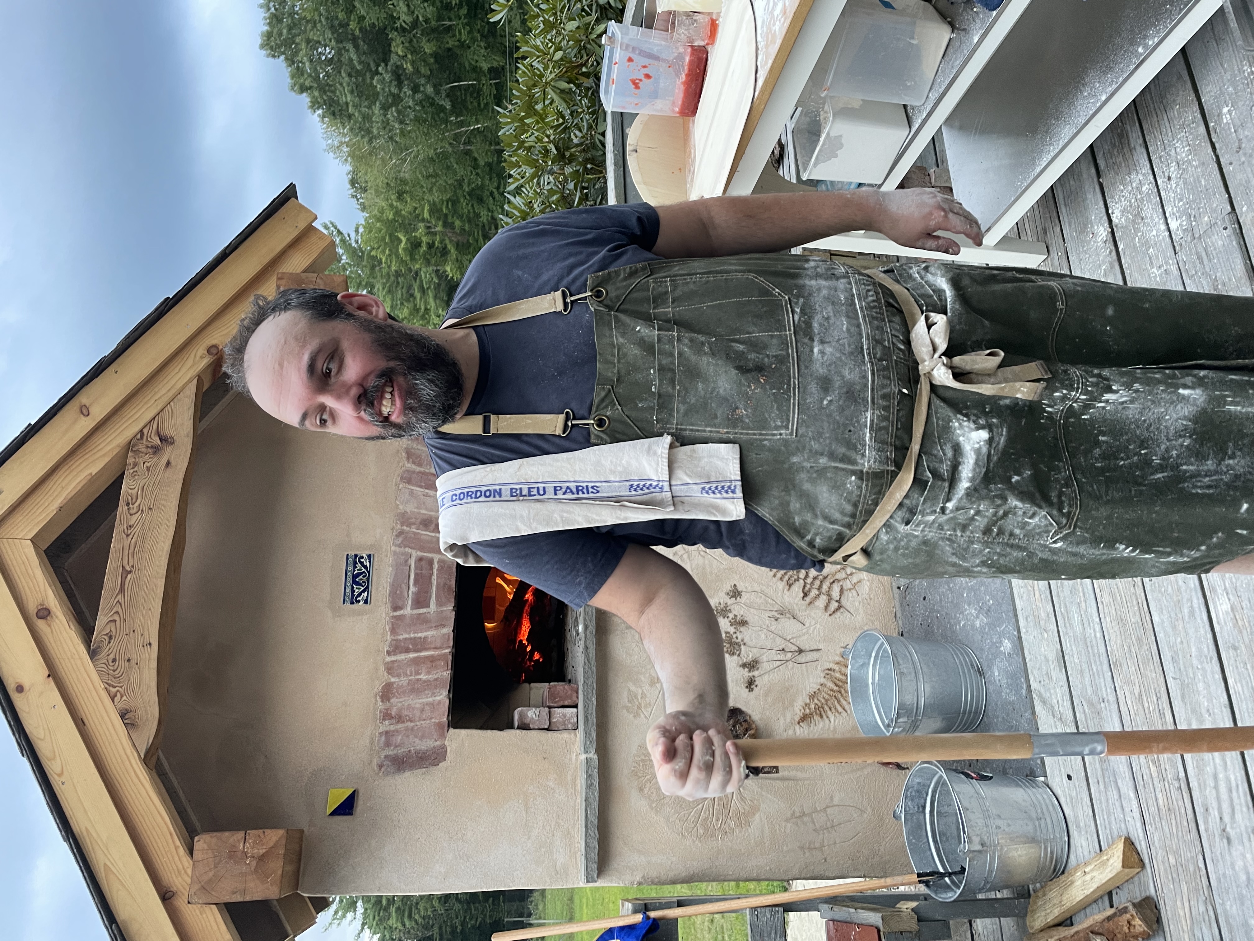 Matt with wood-fired oven